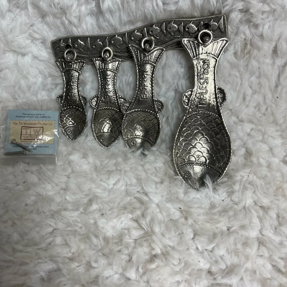 Vintage Tin Woodsman TWpewter set of four Fish measuring spoons with wall hanger
